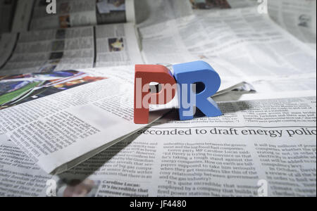 Word PR on newspaper Stock Photo