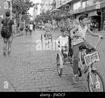 Lebanese take to Hamra Street in Beirut, Lebanon for biking day when scars are banned during hours. Stock Photo