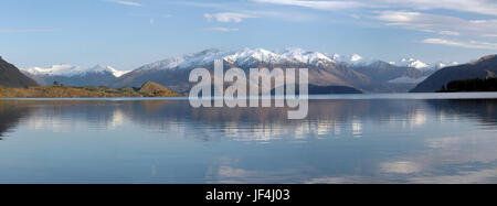 Panoramic view of Lake Wanaka and the Southern Alps of New Zealand. Pleanty of copy space available. Stock Photo