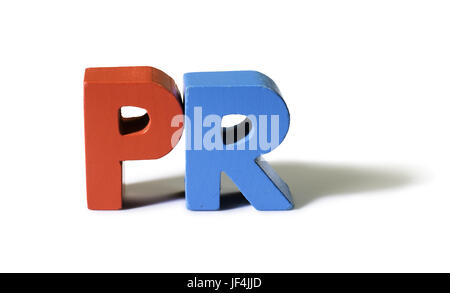 Multicolored word PR made of wood. Stock Photo