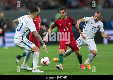 Kazan, Russia. 28th June, 2017. Cedric (R2) of Portugal vies with Pablo Hernandez (L) of Chile during the FIFA Confederations Cup 2017 semifinal match in Kazan, Russia, June 28, 2017. Credit: Bai Xueqi/Xinhua/Alamy Live News Stock Photo