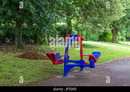 Northampton, U.K. Abington Park, Public Fitness Machines, 29th June 2017. Public Fitness machines have just be installed between the Museum leading down to the main lake in the park, the older machines which have been in use for a few years are left in place as they are well used by the public. Credit: Keith J Smith./Alamy Live News. Stock Photo