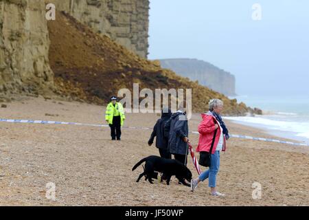 West Bay, Dorset, UK. 29th June, 2017. Police close East Beach and cliff path after a massive cliff fall at West Bay, Dorset, UK Credit: Finnbarr Webster/Alamy Live News Stock Photo