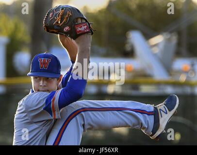 May 16, 2017 - Williamston, NC, USA - Whiteville's Mackenzie Gore goes into the top of his wind-up as he pitches to a better in Williamston, N.C. Wednesday, May 16, 2017. Gore, a senior at Whiteville High School in southeastern North Carolina is predicted to be taken in the top five of the Major League Baseball draft.  He led his NCHSAA 1A team to the state championship for the third time in four years. (Credit Image: © Chuck Liddy/News Observer via ZUMA Wire) Stock Photo