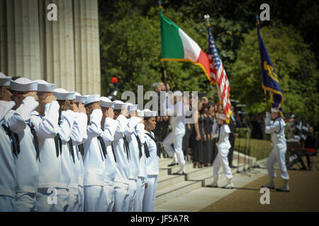 170528-N-UY653-185  NETTUNO, Italy (May 28, 2017) Sailors parade the colors during a Memorial Day ceremony at the Sicily-Rome American Cemetery. During the ceremony, veterans, service members, students and families gathered to honor and pay tribute to those who gave their lives during the liberation of Italy in 1943. U.S. Naval Forces Europe-Africa, headquartered in Naples, Italy, oversees joint and naval operations, often in concert with allied, joint, and interagency partners, to enable enduring relationships and increase vigilance and resilience in Europe and Africa. (U.S. Navy photo by Mas Stock Photo