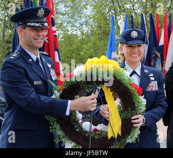 Lt. Gen. Ken Wilsbach and Chief Master Sgt. Gay Veale prepare to lay a wreath May 29 at a Memorial Day ceremony on the Delaney Park Strip in Anchorage, Alaska. Wilsbach and Veale respectively serve at Joint Base Elmendorf-Richardson as the commander and senior enlisted leader of Alaskan North American Aerospace Defense Command Region, Alaskan Command and 11th Air Force. (Photo by Mary M. Rall/U.S. Army Alaska Public Affairs) Stock Photo