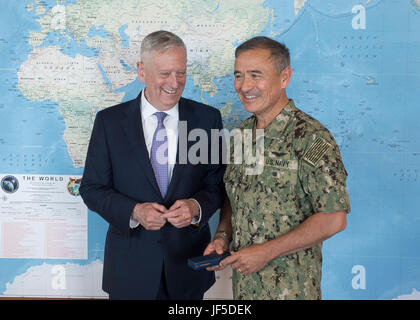 170531-N-WY954-031 CAMP H.M. SMITH, Hawaii (May 31, 2017) – U.S. Secretary of Defense James Mattis meets with United States Pacific Command (USPACOM) Commander Adm. Harry Harris at USPACOM headquarters. This is the first time Mattis has visited USPACOM headquarters since holding office as Secretary of Defense. During the meeting Mattis also met with USPACOM component commanders where they discussed challenges and opportunities in the Indo-Asia-Pacific region.  (U.S. Navy photo by Mass Communication Specialist 2nd Class Robin W. Peak/Released) Stock Photo
