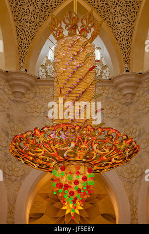 Abu Dhabi, UAE - One of the larger chandeliers in the iconic Sheikh Zayed Grand Mosque in Abu Dhabi in the United Arab Emirates. Stock Photo