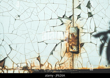 Cracked paint on rusty iron Stock Photo