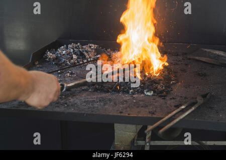 Vise and anvil in a forge shop Stock Photo