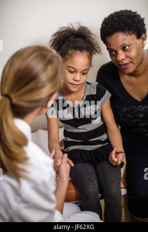 Doctor talking with patient Stock Photo