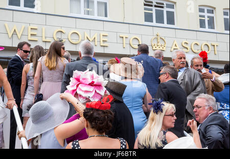 Racegoers at Royal Ascot on Ladies Day climb the stairs to enter the Grandstand Stock Photo