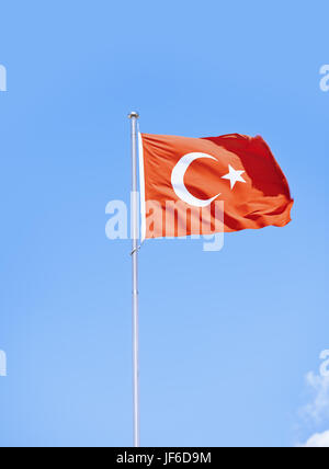 Turkish flag against sky background Stock Photo