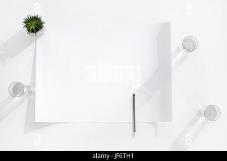 top view of empty white banner with pencil and glasses of water, business establishment Stock Photo