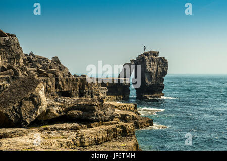 Seascape depicting the Pulpit Rock from the Quarries pathway, with clear blue skies and calm seas on a beautiful summers day Stock Photo