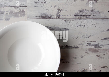 Empty Bowl on a Rustic Table - Directly Above with Copy Space Stock Photo