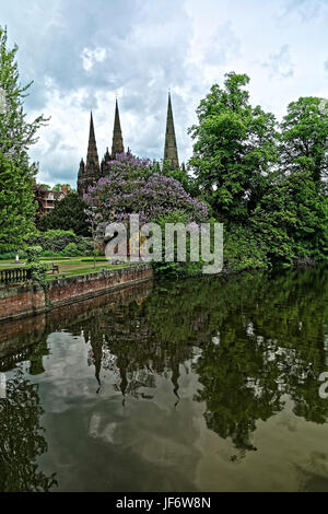 Lichfield Cathedral, dedicated to St Chad and Saint Mary, is in Staffordshire, England and is the only medieval English cathedral with three spires Stock Photo