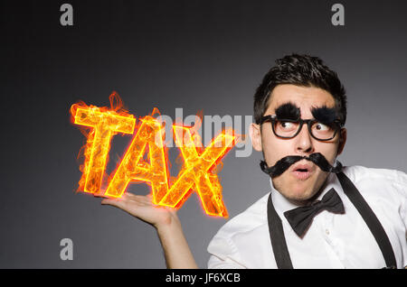 Funny businessman in tax business concept Stock Photo