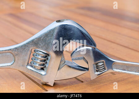 Large and small adjustable wrenches together Stock Photo