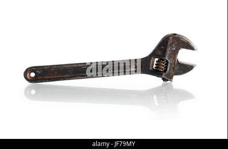 Old rusty adjustable wrench on white background. Clipping path is included Stock Photo