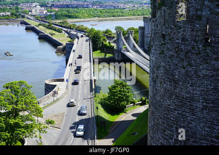 View from Conwy Castle showing the A55 trunk road and also the original which went over Thomas Telfords suspension bridge. Conwy,North Wales, UK. Stock Photo