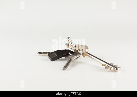 Set of house keys on white background Stock Photo