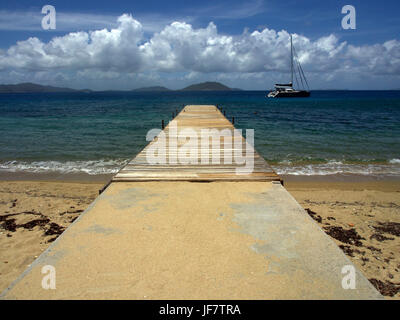 Looking out onto a pear on a sunny day in salt island, British virgin islands. Stock Photo