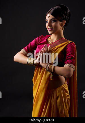 Young indian girl isolated on black Stock Photo