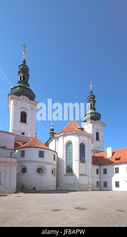 The view on Basilica of the Annunciation of the Virgin Mary, originally built in Romanesque architectural style and the Church of Saint Roch, which is Stock Photo