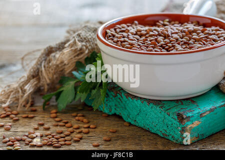 Lentils in a bowl close up. Stock Photo