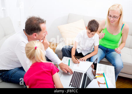 Happy family at home Stock Photo