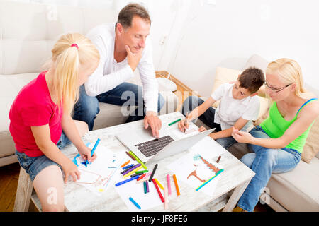 Happy family at home Stock Photo