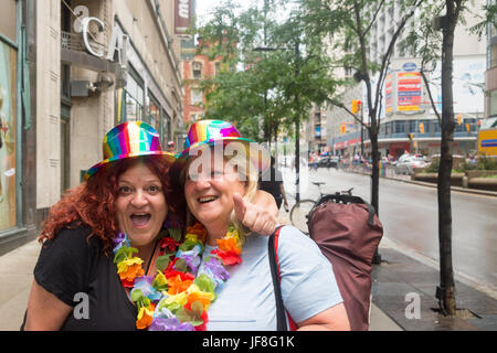 Toronto, Canada - 25 June 2017: Two women posing for the camera before Toronto Gay Pride Parade Stock Photo
