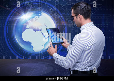 Businessman in futuristic computing concept Stock Photo