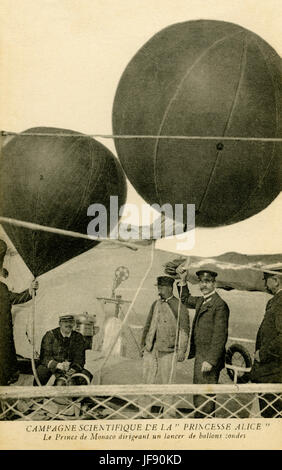 Albert Grimaldi, Prince Albert I of Monaco on the Princess Alice, his oceanographic research ship, releasing weather balloons, early 20th century. Prince Albert known as the father of modern oceanography. Stock Photo