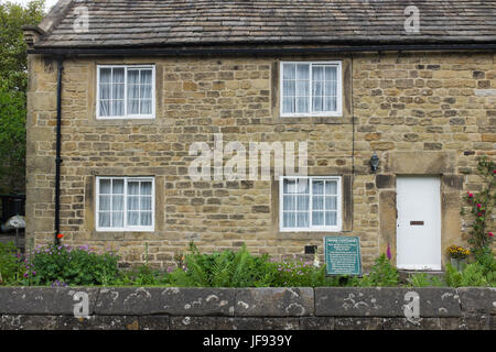 Rose Cottage in the village of Eyam in the Derbyshire Peak District where nine members of one family died from the plague Stock Photo