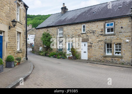 Old stone cottages in the village of Eyam in the Derbyshire Peak District Stock Photo