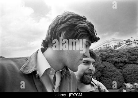 On April 22, 1971, Vietnam veteran Lt. John Kerry became the first Vietnam veteran to testify before Congress about the war, when he appeared before a Senate committee hearing on proposals relating to ending the war. Kerry , the following day -April 23, 1971 -  participated in a demonstration with thousands of other veterans in which he and other veterans threw their medals and ribbons over a fence erected at the front steps of the United States Capitol building to dramatize their opposition to the war. Here, Kerry is shown just after delivering an antiwar speech to the thousands of gathered p Stock Photo