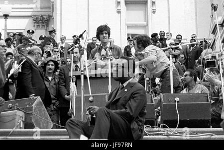 On April 22, 1971, Vietnam veteran Lt. John Kerry became the first Vietnam veteran to testify before Congress about the war, when he appeared before a Senate committee hearing on proposals relating to ending the war. Kerry is shown here as he prepares to speak on the U.S. Capitol steps the day after his testimony - April 23, 1971 - as he participated in a demonstration with thousands of other veterans in which he and other veterans threw their medals and ribbons over a fence erected at the front steps of the United States Capitol building to dramatize their opposition to the war. Stock Photo