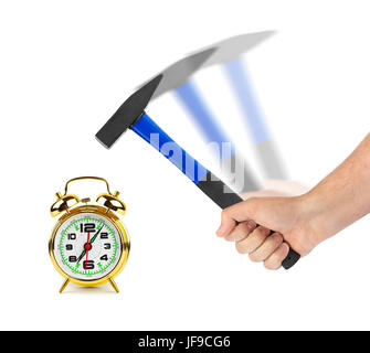 Hand with hammer and alarm clock Stock Photo