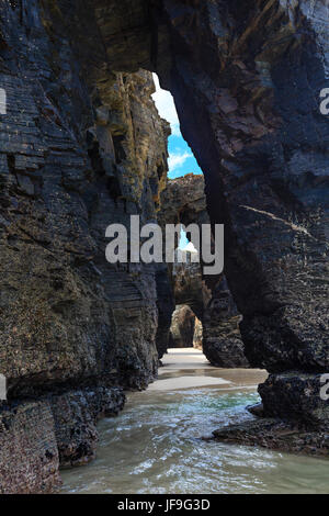 Natural arches on beach. Stock Photo
