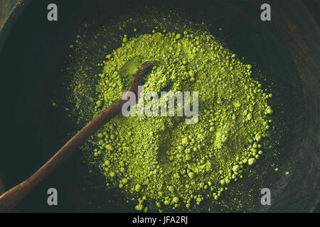 Japanese Matcha green tea powder in bowl, top view Stock Photo