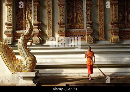 Thai buddhist monks engaged in various work, social and spiritual activities in and around Chiang Mai, Thailand Stock Photo