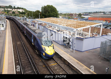 29th June 2017. Strood, Kent , UK. Builidng work progress on the new station building at Strood station Kent, UK as a high speed train passes through. Stock Photo