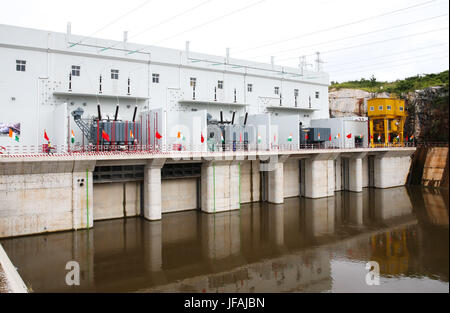 (170630) -- SOUBRE (COTE D'IVOIRE), June 30, 2017 (Xinhua) -- Photo taken on June 30, 2017 shows a view of the Soubre hydroelectric power station near the city of Soubre in Cote d'Ivoire. A ceremony was held Friday in Cote d'Ivoire to officially mark the initiation of electricity generation at Soubre hydroelectric power station, which was built by a Chinese company. With an installed capacity of 275 MW, the 4.5-km-long Soubre dam is the largest of its kind so far in the western African country. (Xinhua/Pan Siwei) Stock Photo
