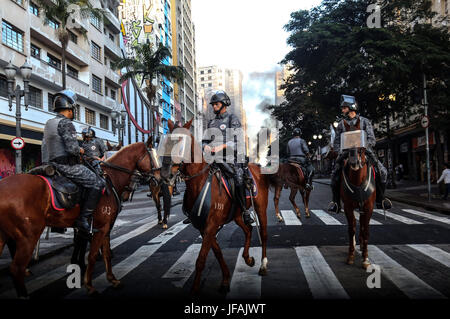 Sao Paulo, Brazil. 30th June, 2017. Police officers patrol on the street in Sao Paulo, Brazil, on June 30, 2017. Nationwide protests on Friday rejected unpopular labor and social security reforms backed by the government of President Michel Temer. Credit: Rahel Patrasso/Xinhua/Alamy Live News Stock Photo