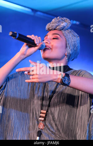 New Orleans, LA, USA. 30th June, 2017. Yuna at the 2017 ESSENCE Festival Presented By Coca Cola at the Mercedes-Benz Superdome on June 30, 2017 in New Orleans, Louisiana. Credit: Walik Goshorn/Media Punch/Alamy Live News Stock Photo