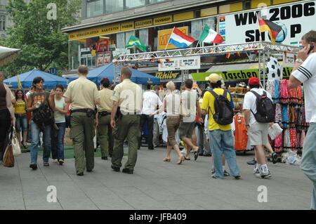 German and Ecuadorian soccer fans at the 2006 World Cup at Breitscheidplatz in Berlin on 20 June 2006 (before the match between Ecuador and Germany) Stock Photo