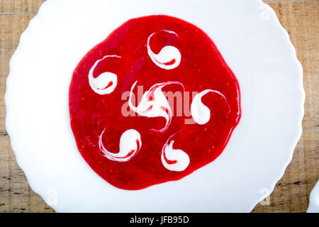 Raspberry dressing for ice cream Stock Photo