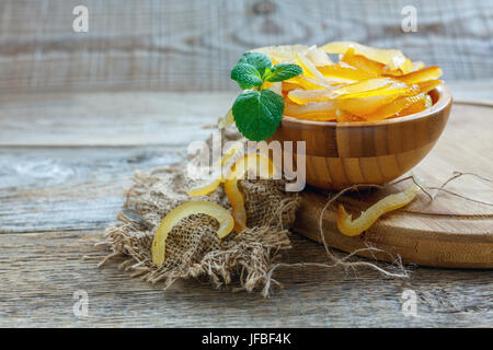 Homemade candied fruit and mint in a bowl. Stock Photo